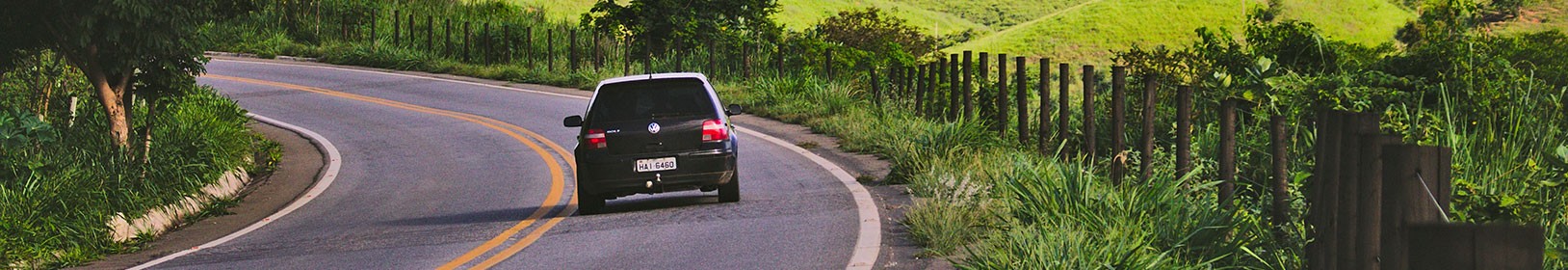 Country road with green hills